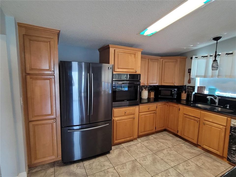 Kitchen-wood cabinets and granite counters