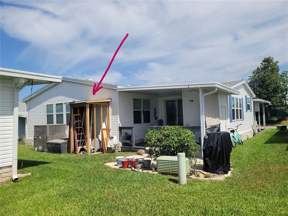 Back of house has deck (old shed being removed)