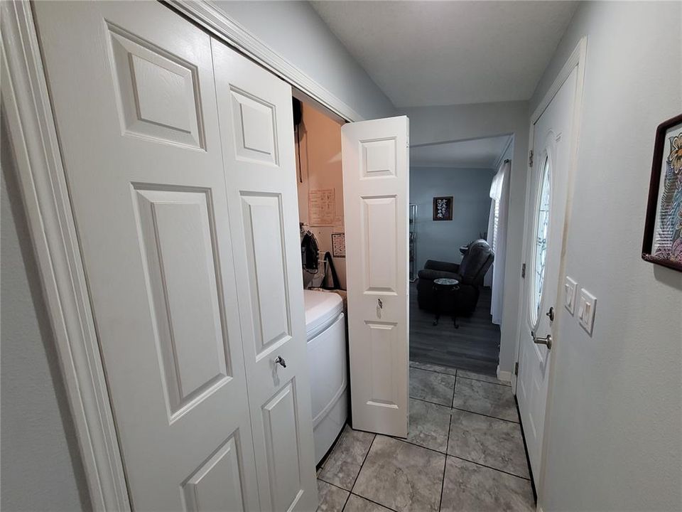 Laundry closet in hall