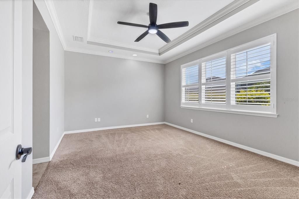 Professionally installed built-ins in both Primary Bedroom Walk-in Closets