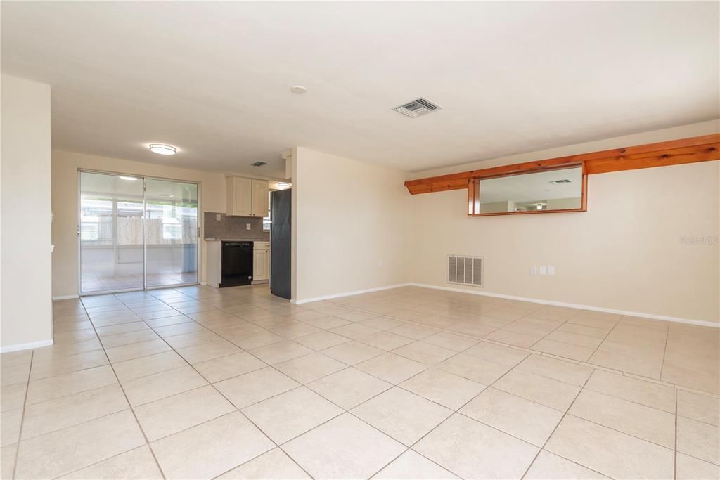 Sliding glass door from dining room to screen porch.