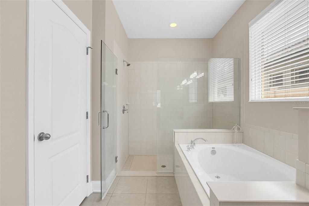 Owner's Bathroom with Soak in tub and walk in shower