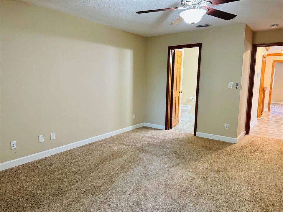 Second Floor Bedroom with View to Hall and En-Suite Bathroom