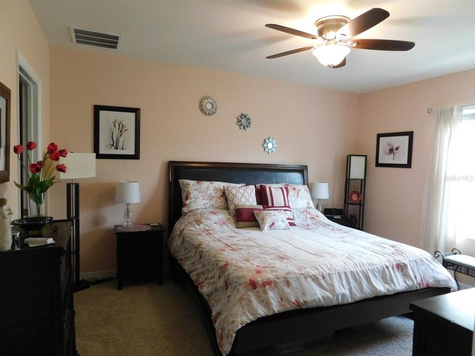 Spacious master suite with two walk in closets