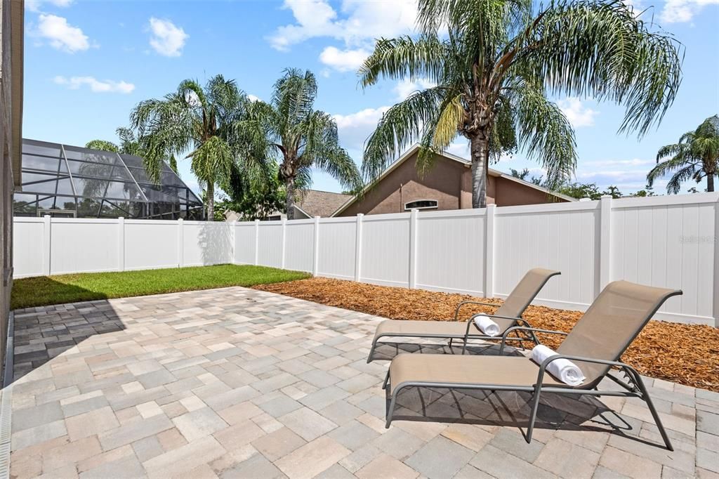 Fully Fenced Backyard with Extended Pavers