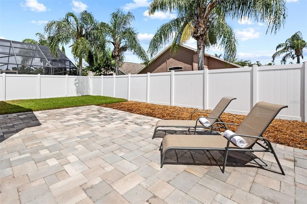 Fully Fenced Backyard with Extended Pavers