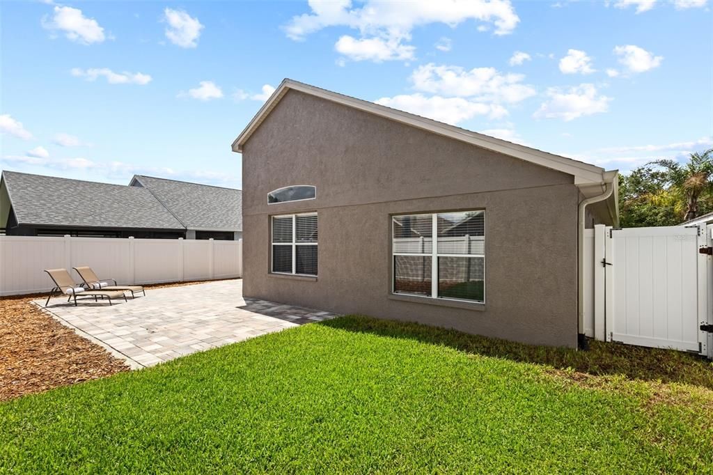 Fully Fenced Backyard with Extended Pavers