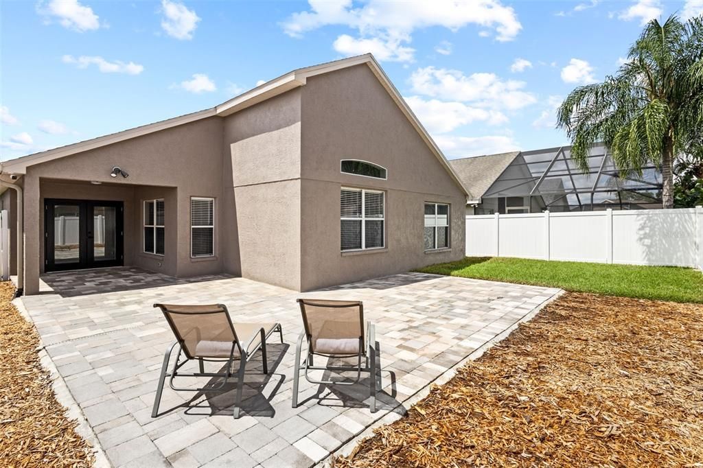 Backyard with extended pavers