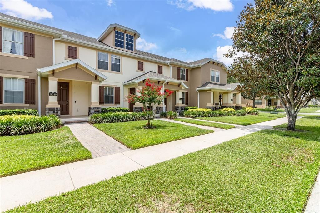 Sidewalks, lighting, and plenty of green space=massive curb appeal