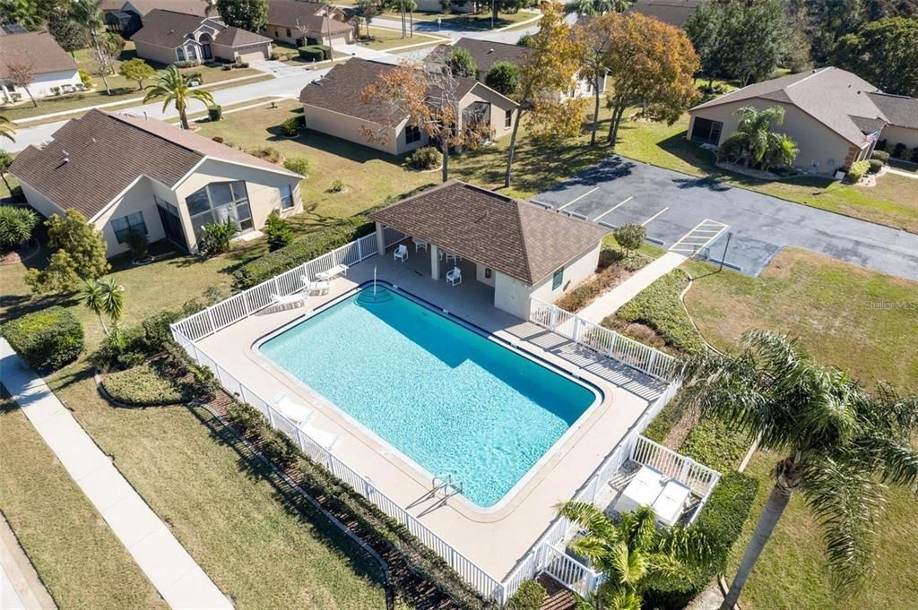 House is left of this pool.