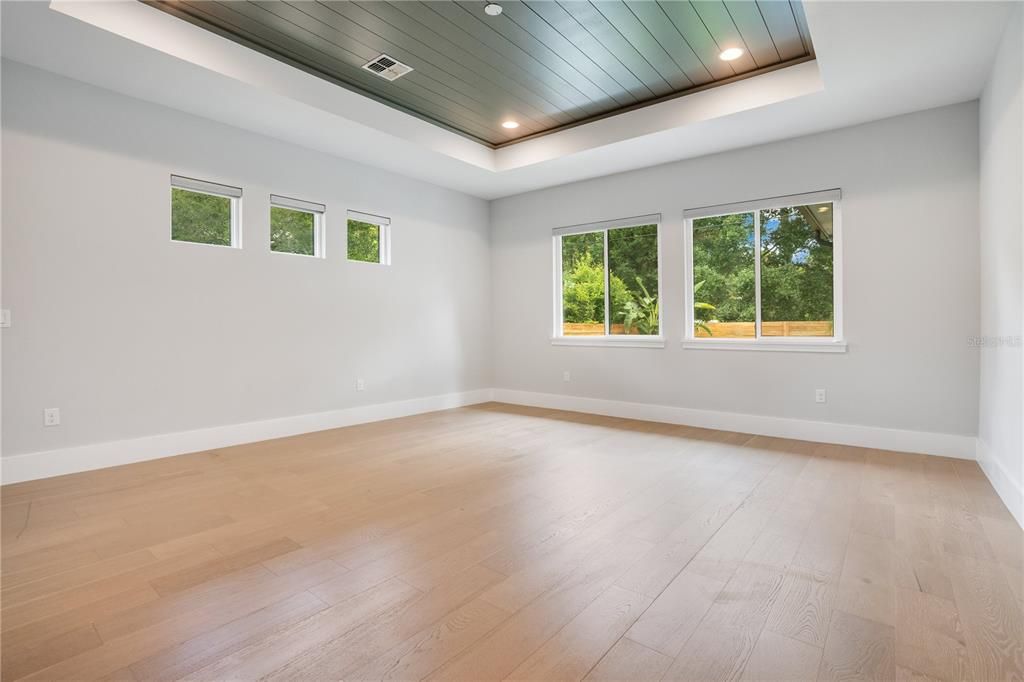 Primary Bedroom, with Hunter Douglas motorized shades.