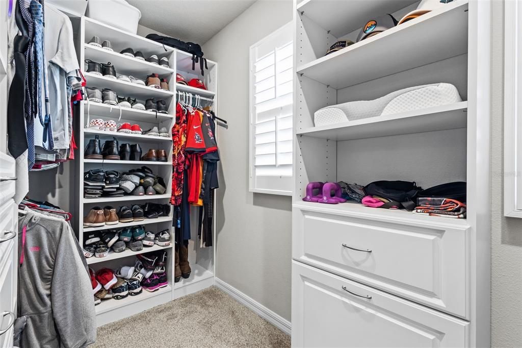 Primary Bedroom Closet with Built ins