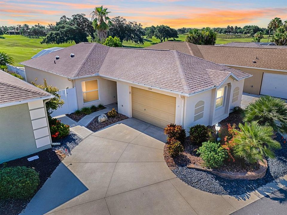 NICE CURB APPEAL WITH LOW MAINTENANCE LANDSCAPING, STACKED STONE CURBING, ROCK BEDS WITH PALMS AND FLOWERING SHRUBS!  NEW ROOF 2022!