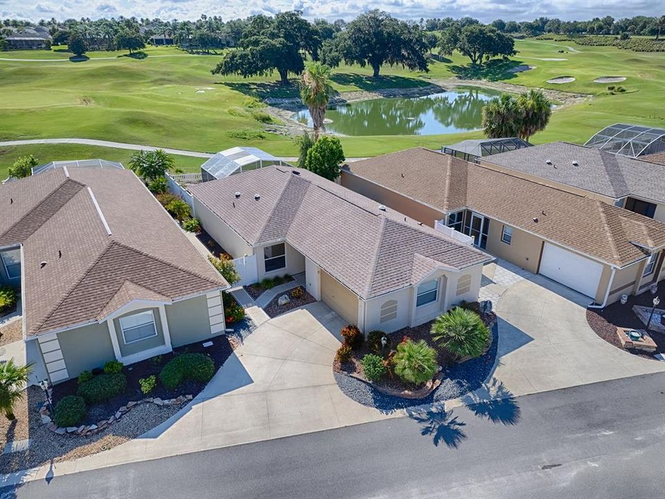 SPECTACULAR GOLF COURSE AND WATER VIEW ON THIS LOVELY 2/2 COURTYARD VILLA LOCATED IN THE VILLAGE OF DUVAL.