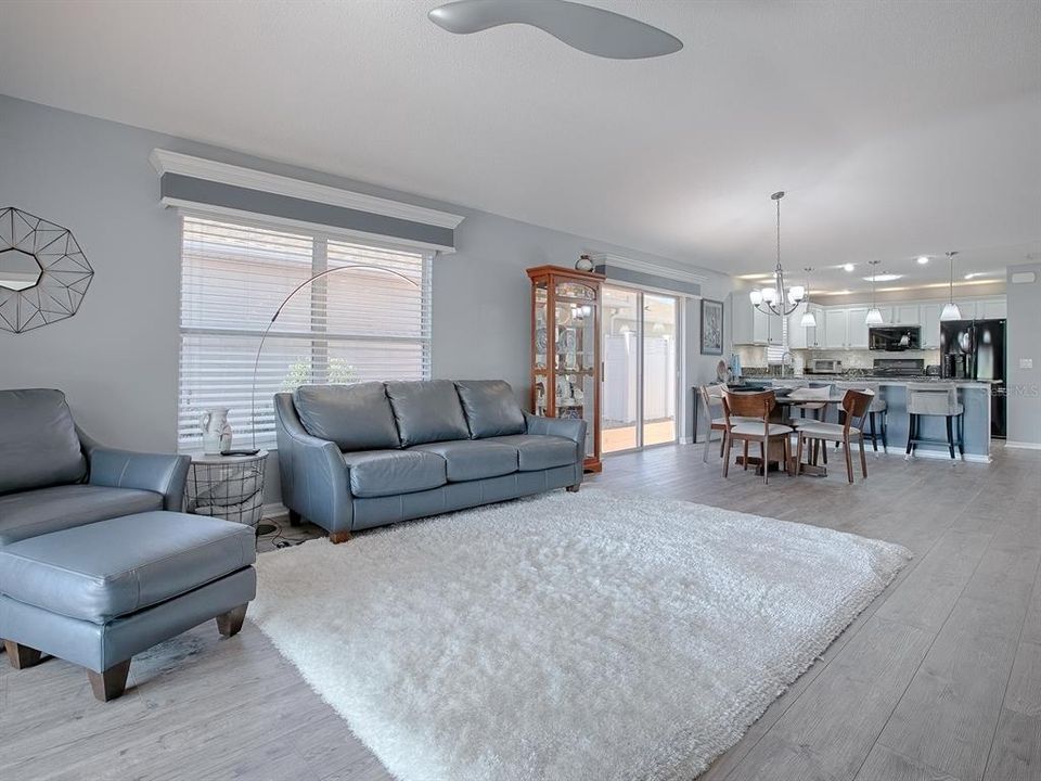 VAULTED CEILINGS WITH NEW CUSTOM CEILING FAN.