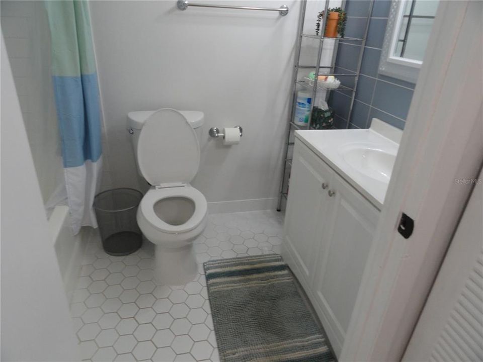 Bathroom two has access from all the main space