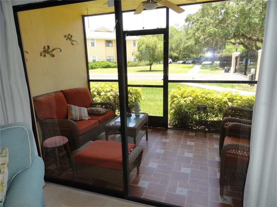 This is the rear screened patio with accress to the yard