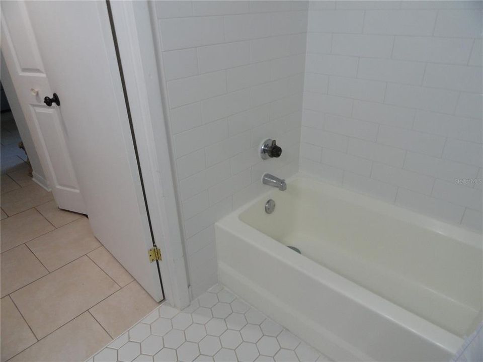 Bathroom two has bathtub/shower.