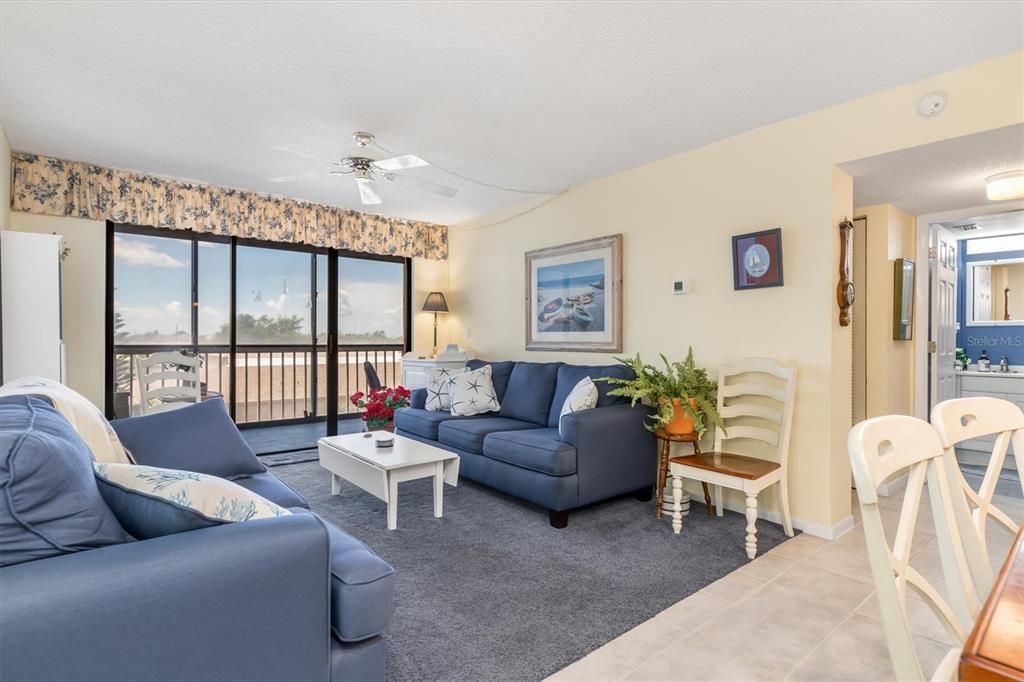 Beautiful living room with sliders to balcony/porch.