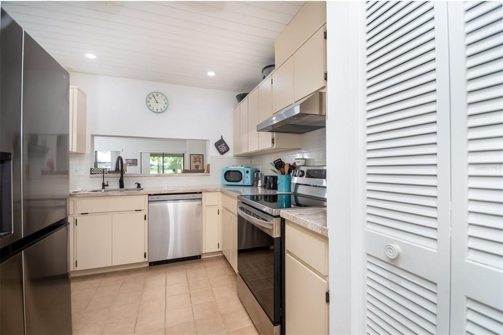 Kitchen with Pantry and Garage Entrance