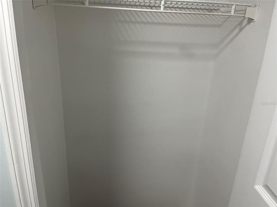 Hall closet, next to half bath