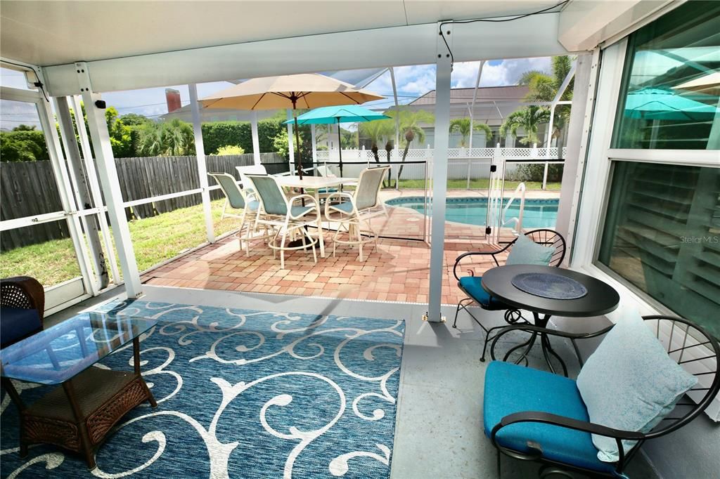 Large seating area on pool patio