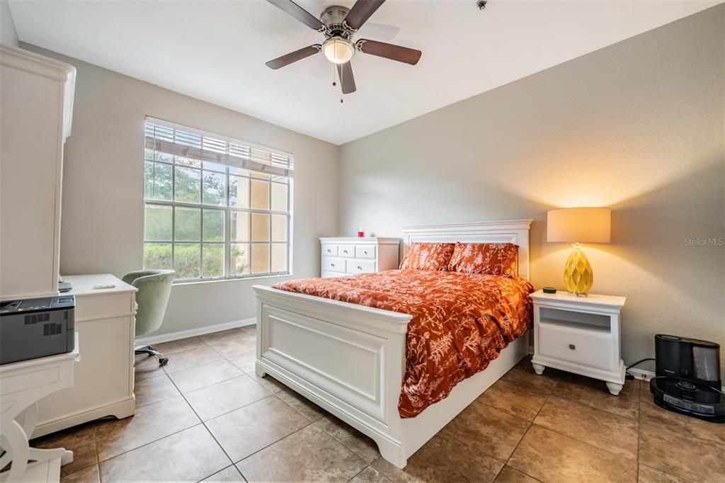 Guest Bedroom, new flooring, ceiling fan and light.