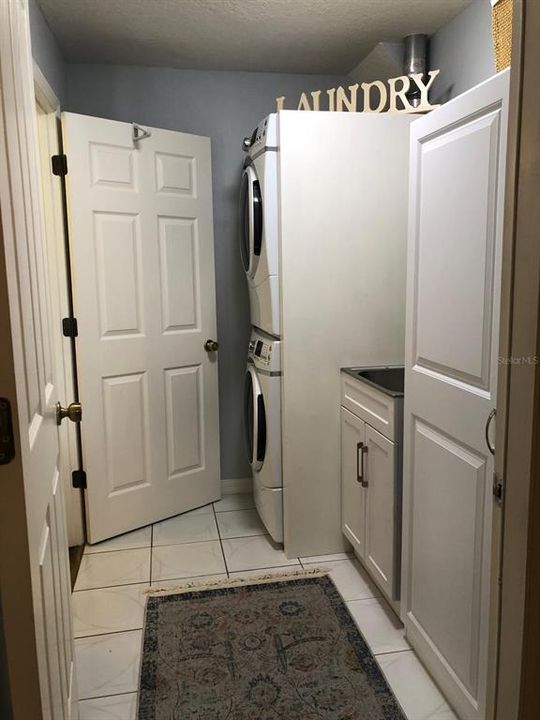 To guest's bedrooms and bathroom