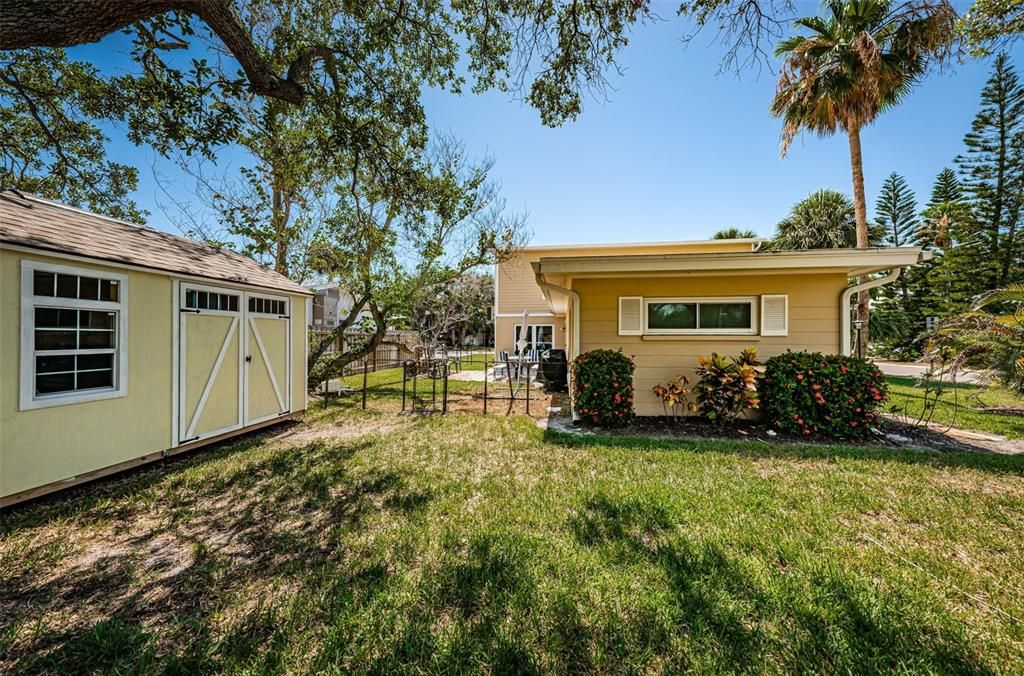 Large corner lot with a separate Lowe's Shed