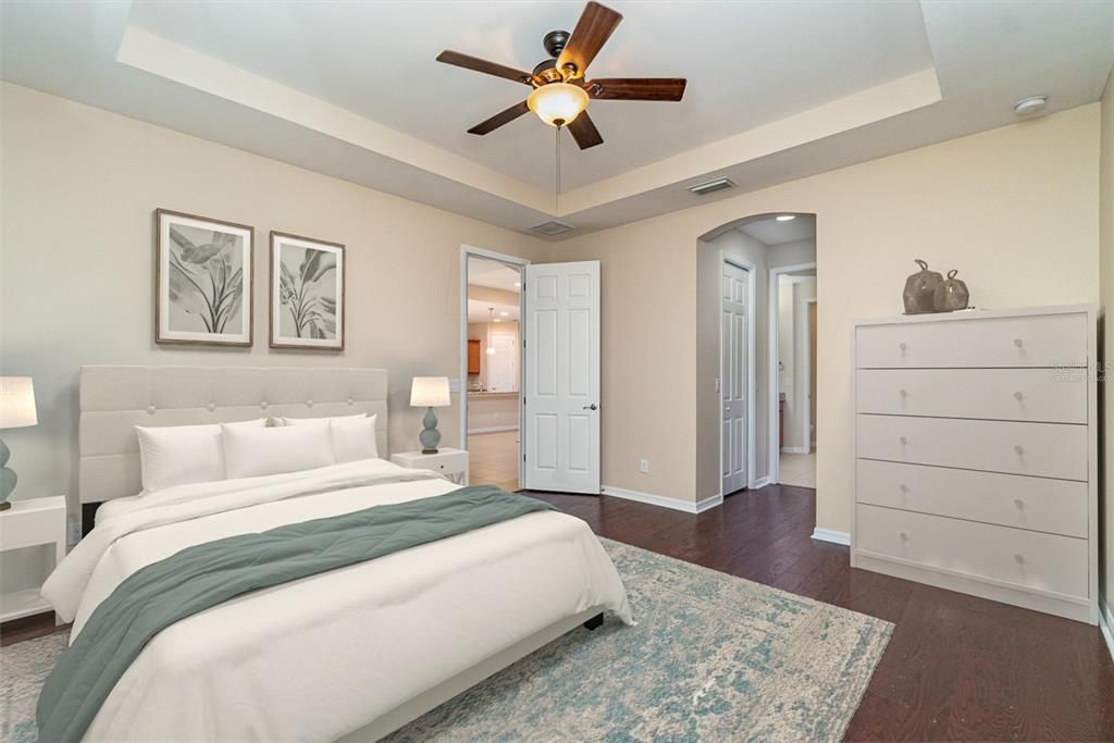 This master bedroom photo is virtually staged