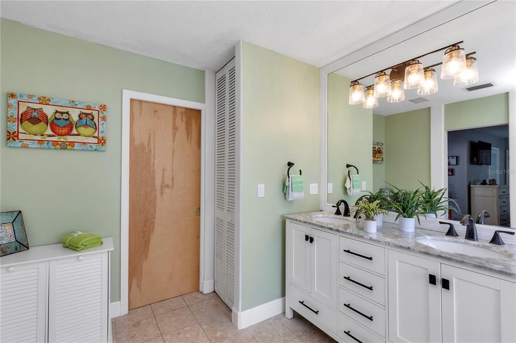 Primary bedroom- barn door to primary bath