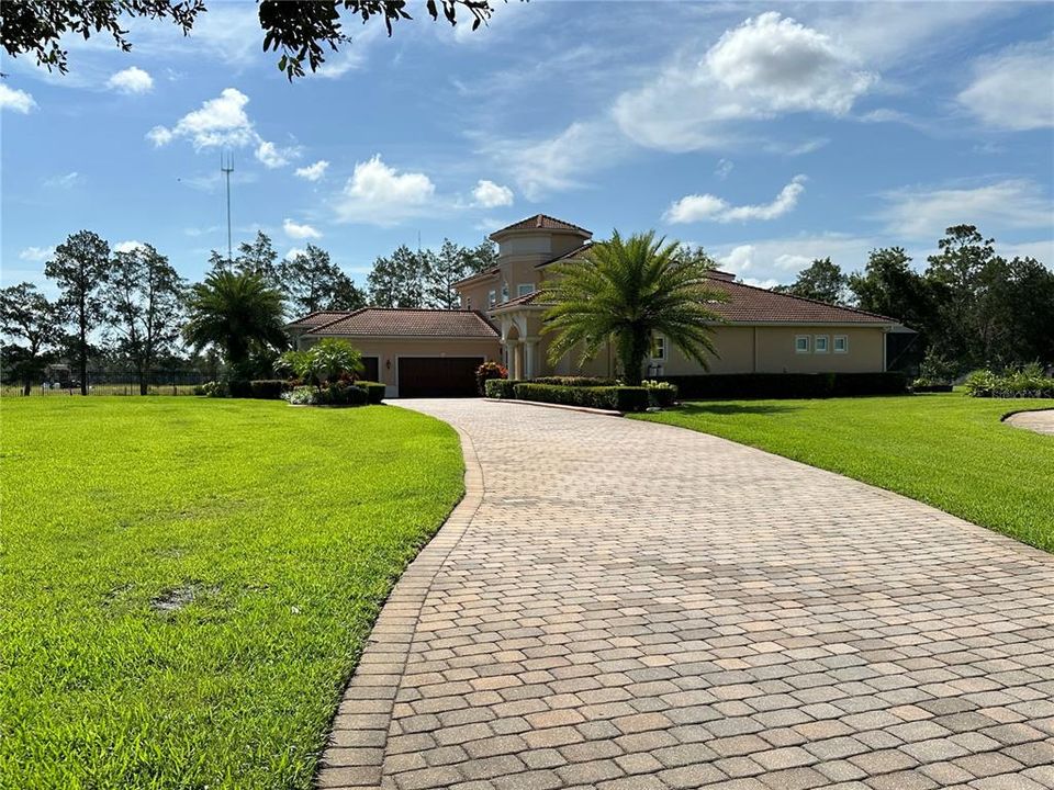 Front home with long driveway