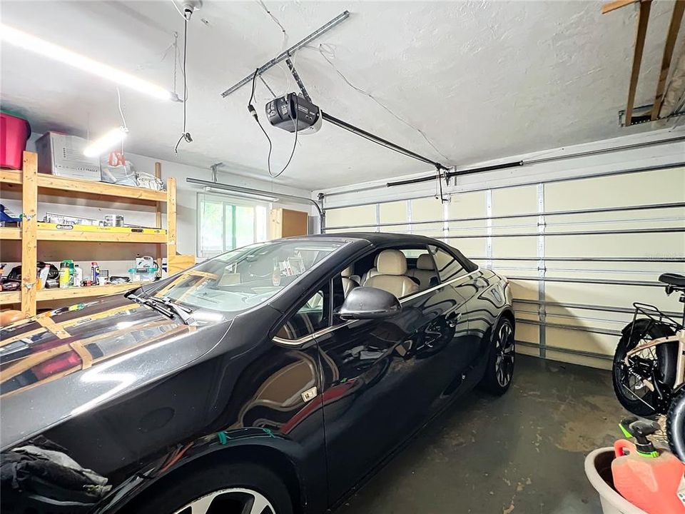 2 car garage with shelving units