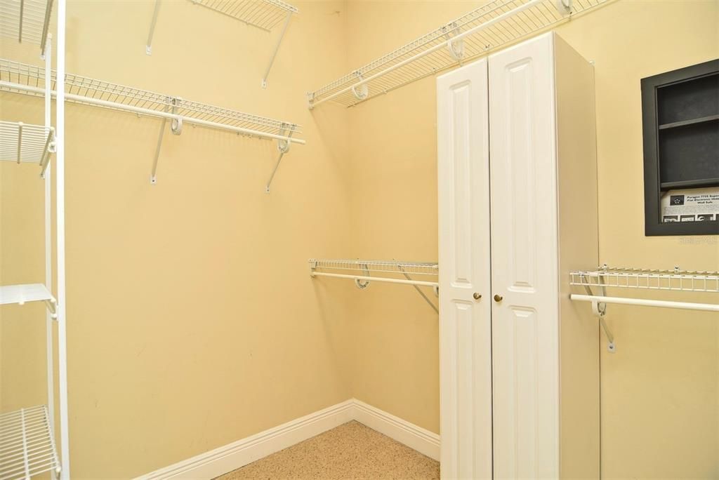 Primary Bedroom closet  with  installed wall safe