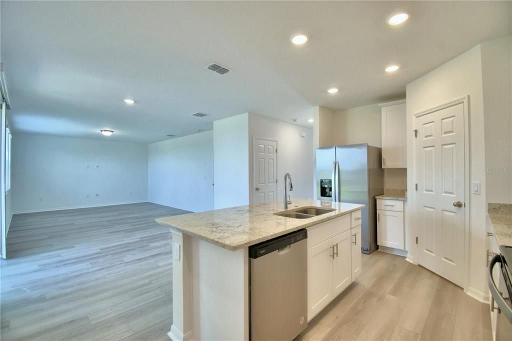 kitchen, dining area and great room