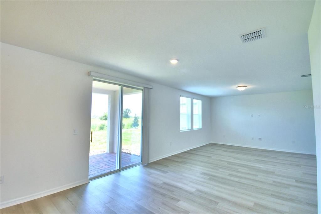 looking toward dining area and great room from kitchen