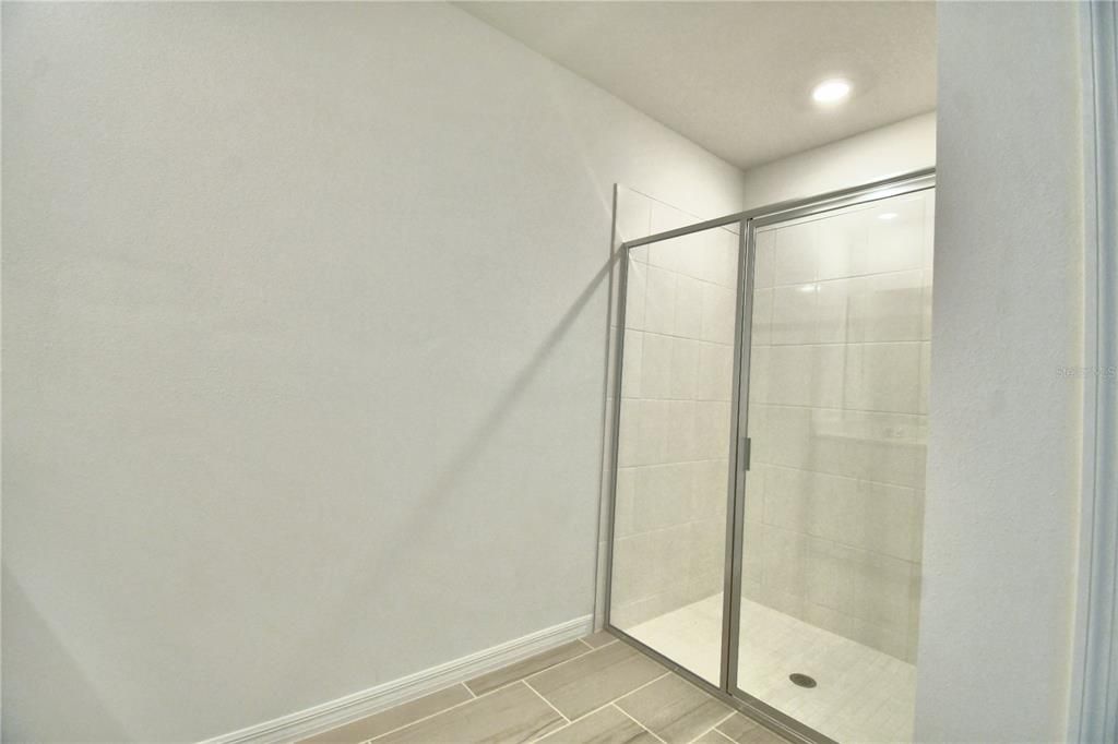 owner's en suite tile shower