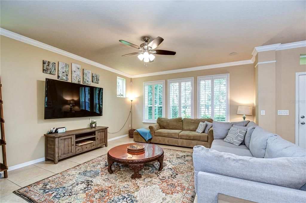 Great room floorplan features plantation shutters!