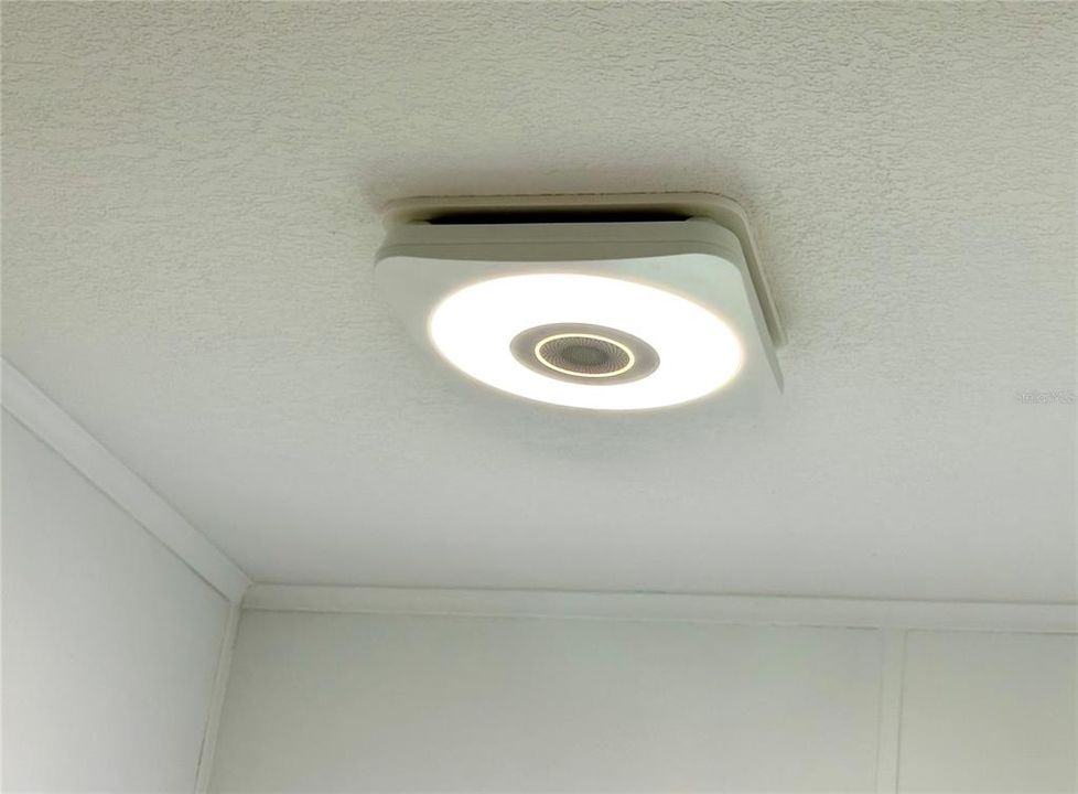 Bluetooth enabled exhaust fan speakers in both bathrooms