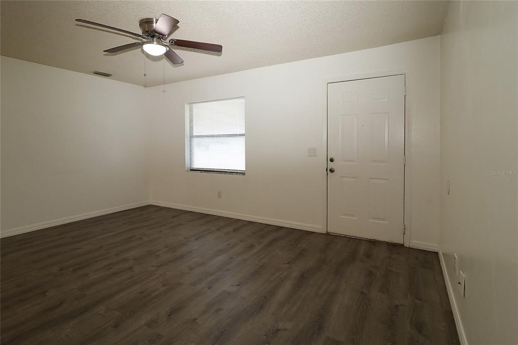 with spacious living room...