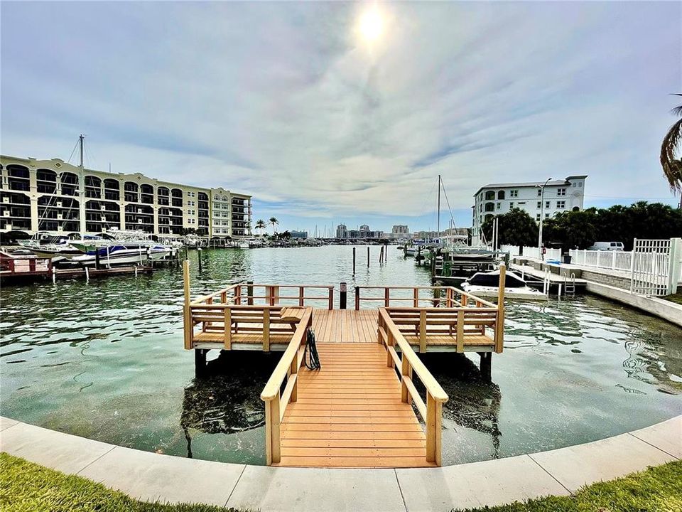 Dock on water for fishing and beautiful Clearwater Beach sunsets