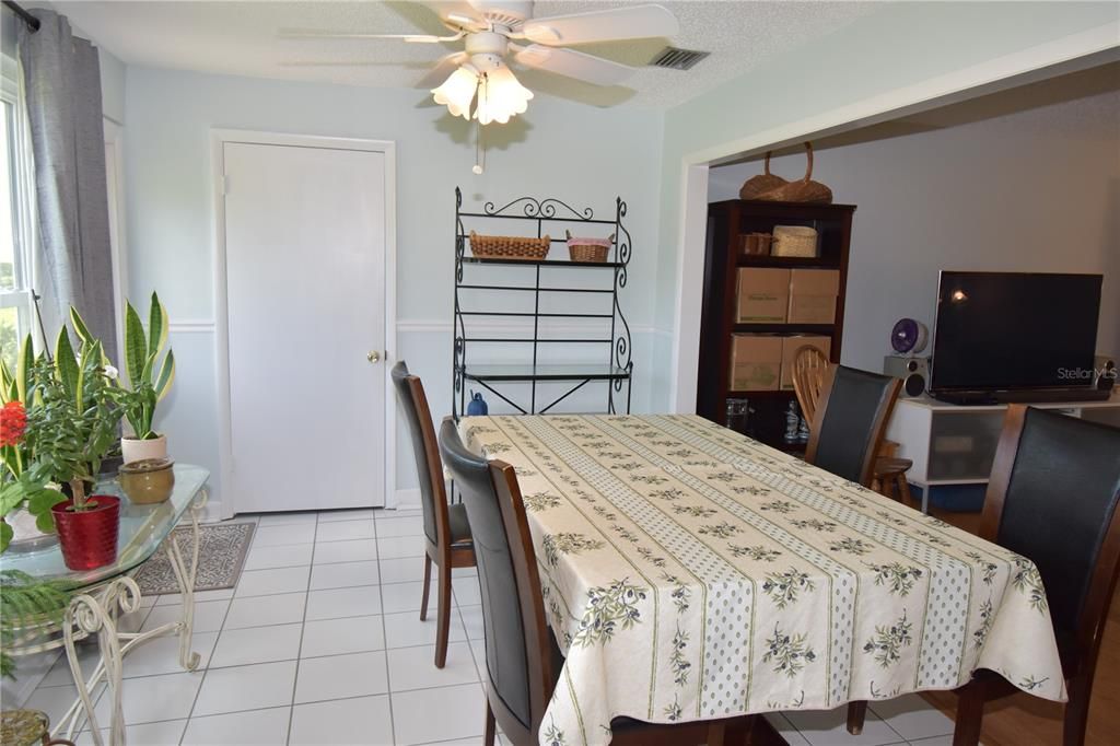 Dining area off of the kitchen with courtyard access.