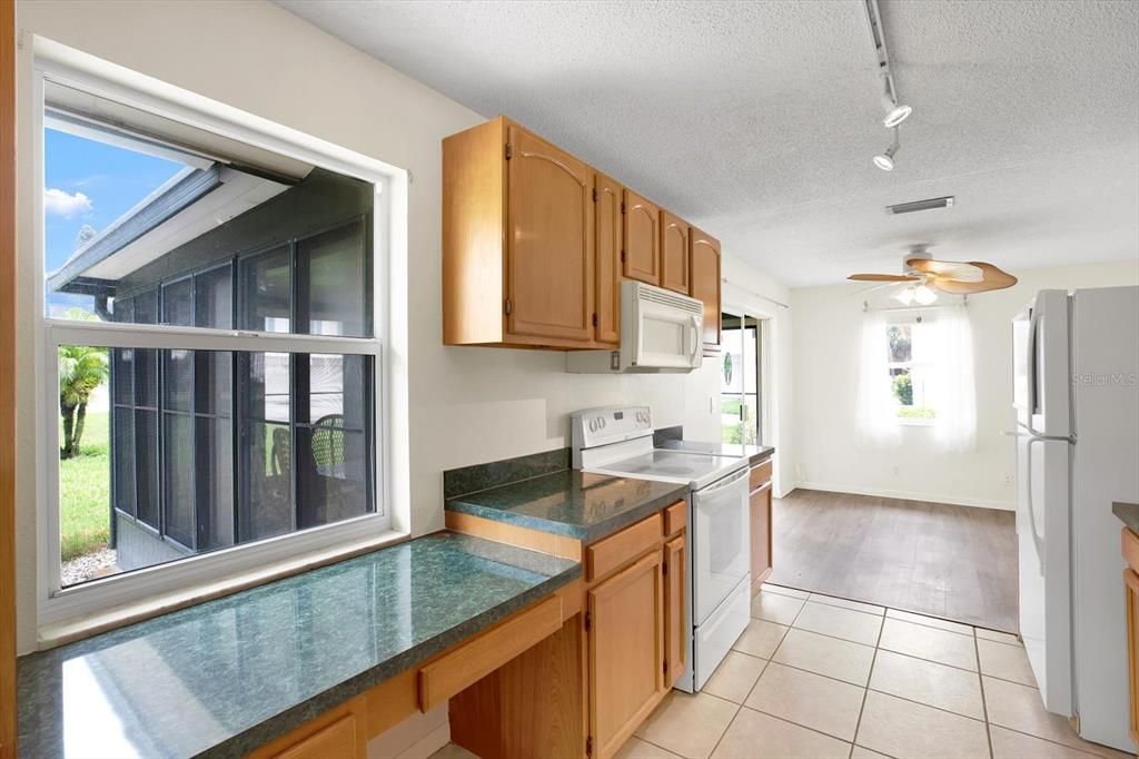 Kitchen with window that looks onto your private lanai