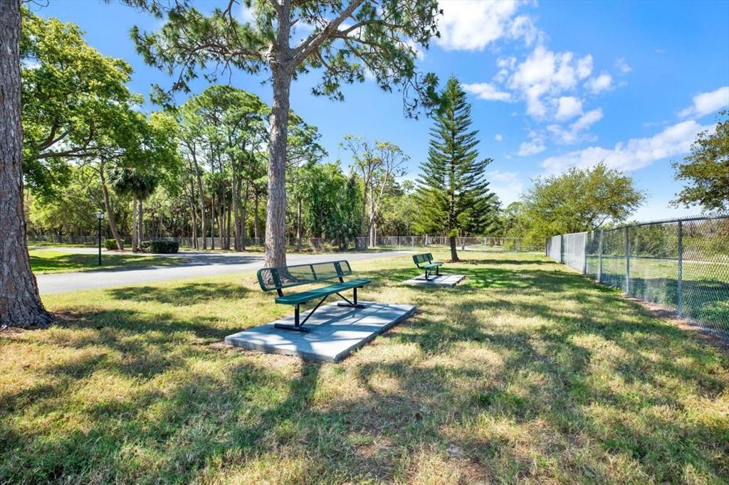 Ample greenspace and private entrance to Clam Bayou Nature Preserve