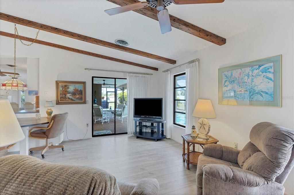 Family Room with sliders to pool & lanai