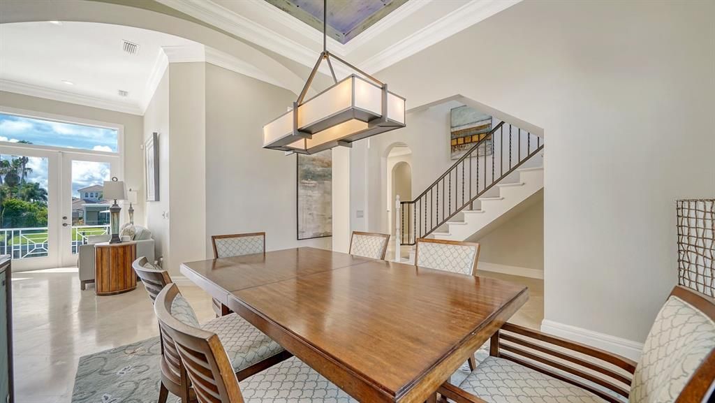 Another view of dining room which opens to formal living room and kitchen area