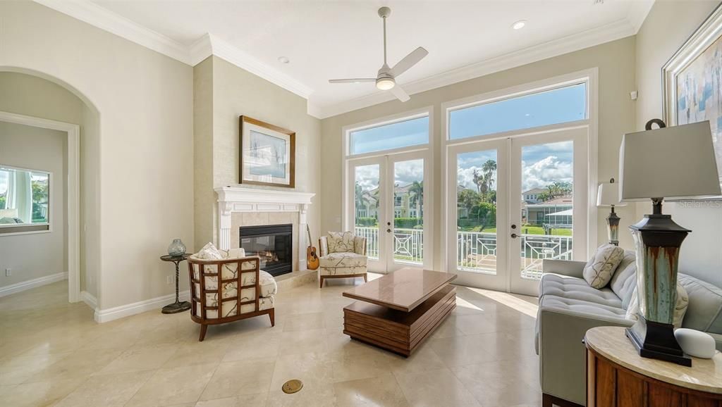 Formal living room has gas fireplace