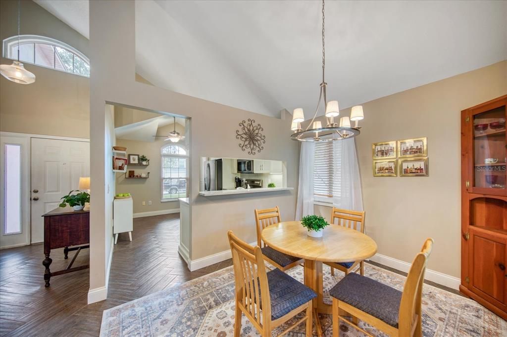 Kitchen renovation with cabinets, quartz counters, appliances & matched flooring~