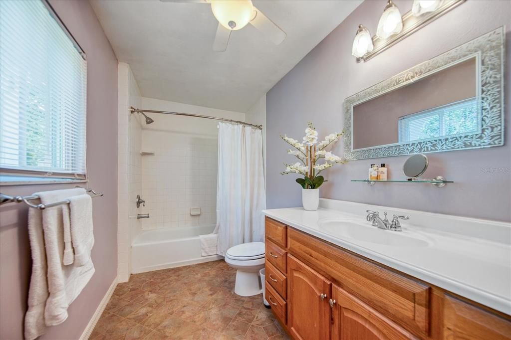 Oversize vanity & great lighting in the master bath~