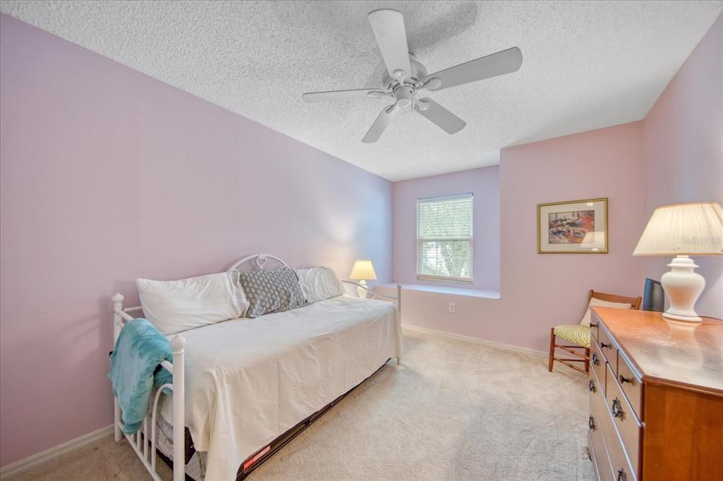 Bedroom 2 with window seat overlooking the front yard~